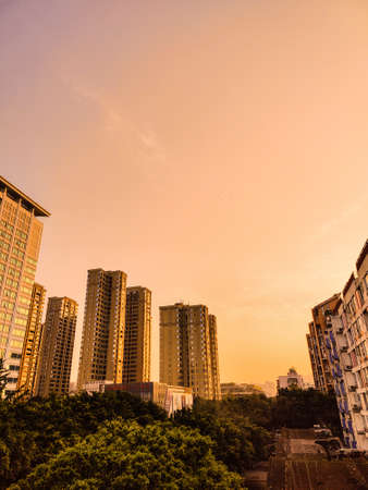 a cloudy sunset landscape with sunの写真素材