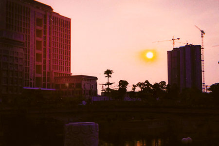 a cloudy sunset landscape with sun