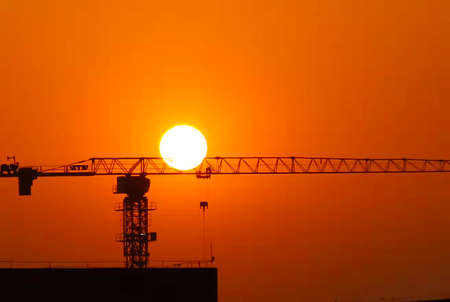 beautiful cloudy sunset landscape with sunの写真素材