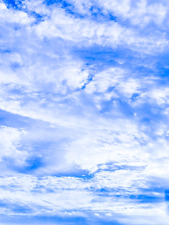 Beautiful blue sky background with tiny clouds