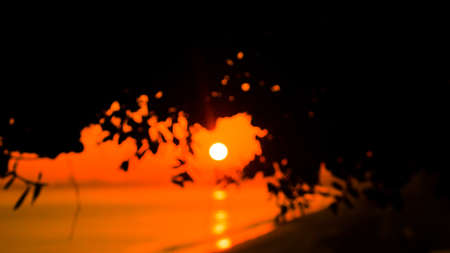 Beautiful cloudy sunset landscape with sunの写真素材