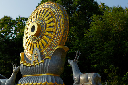 Wheel of life : Dhamma for Release. The details of the ancient texts around The wheel of life symbol are "We protect virtue so that virtue will protect us."の写真素材
