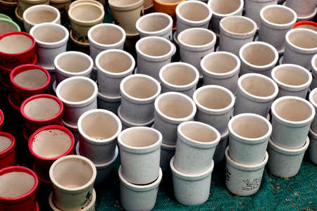 Colourful pots, handmade ceramics folk crafts city market place street bazaar outdoor glass cup plate colourfulの写真素材