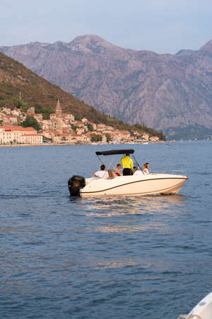 Tourists on the boat in the Bay of Kotor in Montenegro.
