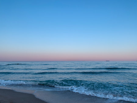 Sunset on the beach in the evening. The sea and sky.の写真素材