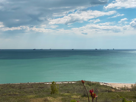 View of the sea and blue sky with white clouds, Ukraine.の写真素材