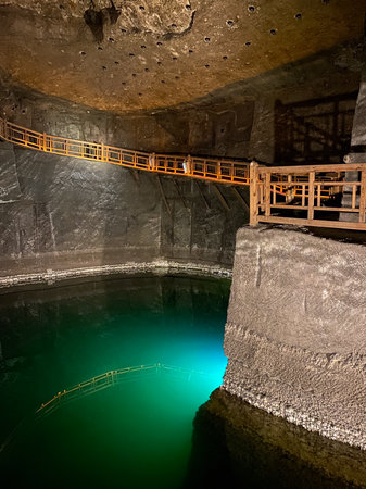Interior of the mine with green water and stairs.の写真素材