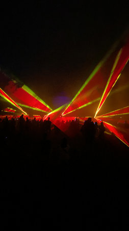 Colorful laser show at night, closeup of photoの写真素材