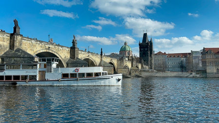Charles Bridge in Prague, Czech Republic. Blue sky with white clouds.の写真素材