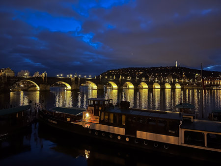Charles Bridge in Prague, Czech Republic. Vltava river with boats.の写真素材