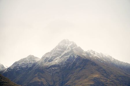 Snowy cloud mountains in Queenstown, New Zealand