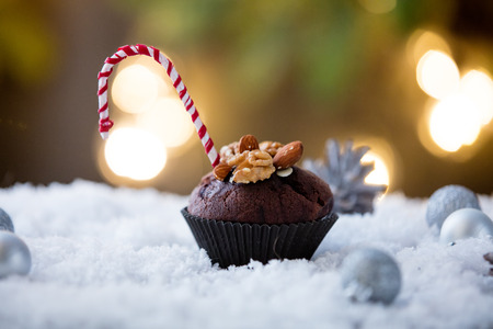 Sweet chocolate muffin on christmas backgroundの写真素材