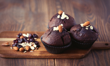 Chocolate muffin on wooden tableの写真素材