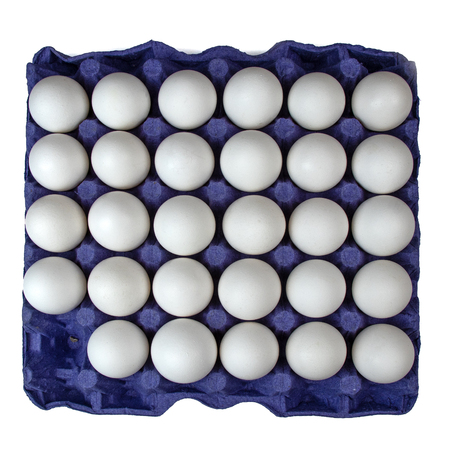 White eggs in carton on white background