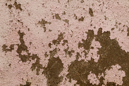 Concrete old wall paint peeled off due to mosture and aged, texture or background