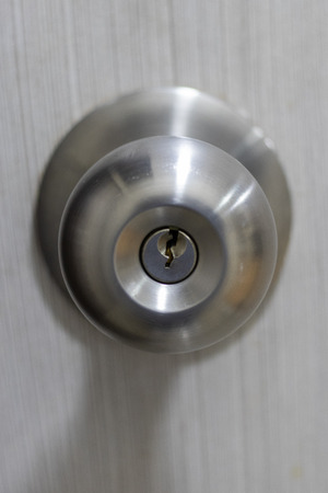 Door lock with a keyholeの写真素材