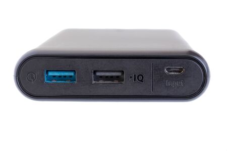 Power bank (battery charger) with high speed charging usd port isolated on a white background