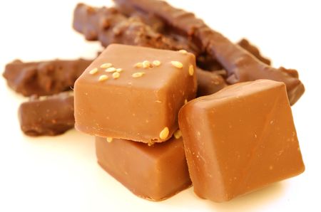 chocolate pieces and white background, ideal for your designの写真素材