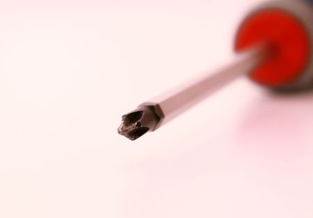 close-up of used screwdriver, symbol of hard workingの写真素材