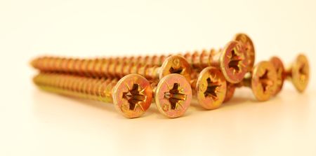 a row of steel screwsの写真素材