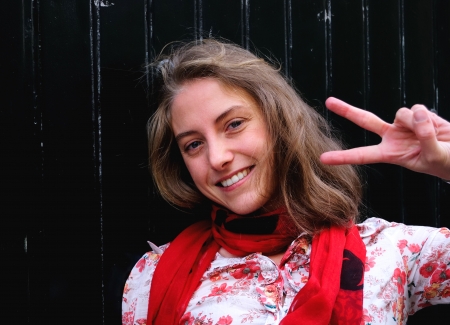 Outdoor portrait of smiling charming young woman の写真素材