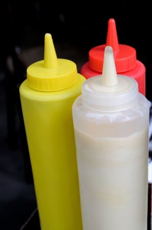 Ketchup, mustard and mayonneseの写真素材