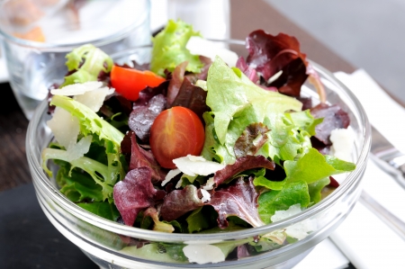 delicious fresh lettuce with tomatoの写真素材
