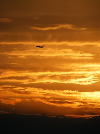 Sunset and planeの写真素材