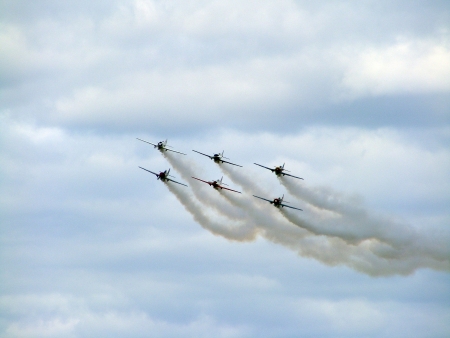TUKUMS, LATVIA - AUGUST 1: The Great britain aerobatic display team the Yakovlevs display at Tukums airshow Event August 1, 2009 in Tukums, Latvia のeditorial素材