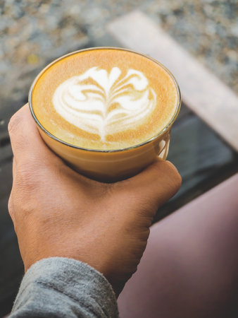 Fresh coffee latte brewed by baristaの写真素材