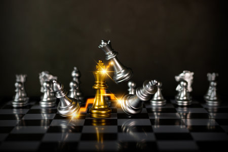 Golden chess to use your opponent's business strategy for future victories. play plan Think for a solution. Work as a team. Chess concept represents success and team work.の写真素材