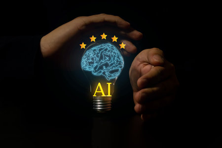 Hand holding light bulb,AI, Machine learning, Hands of robot and human touch on big data network.の写真素材