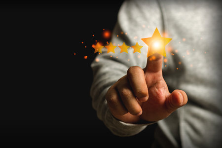 customer experience concept hand showing five star excellent score on background, copy spaceの写真素材