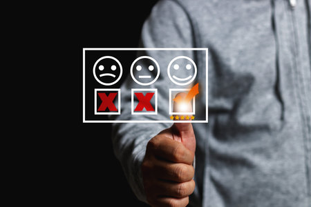 customer experience concept hand showing five star excellent score on background,copy spaceの写真素材