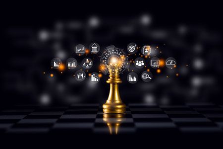 The golden Queen chess piece stands out in the center of the board against a pitch-black background, symbolizing leadership, strategy, It is suitable for business, success, and planning concepts.の写真素材