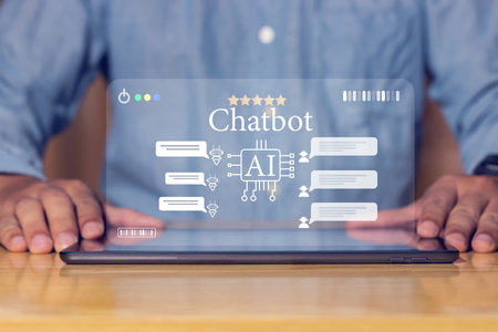 AI chatbot interface on digital tablet for business, customer support, online service, and modern communication technology.の写真素材