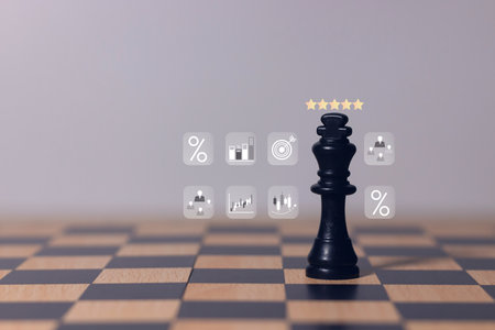 Black king chess piece on wooden chessboard, symbol of leadership, strategy, power, business decision, competition and success.の写真素材