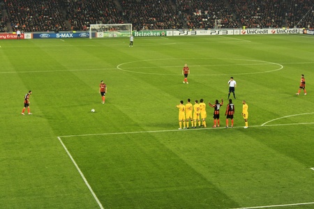 DONETSK, UKRAINE - NOVEMBER 3, 2010: Epizode Champions League match in Donetsk Donbass Arena November 3, 2010. FC Shakhtar Donetsk beat kick on goal FC Arsenal Londonのeditorial素材