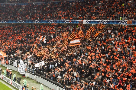 DONETSK, UKRAINE - SEPTEMBER 28, 2011: The match of the Champions League FC Shakhtar Donetsk vs. FC Apoel Cyprus in Donetsk Donbass Arena on September 28, 2011. Fans do not help - the match ended in a drawのeditorial素材
