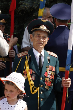 SLAVIANSK, UKRAINE - MAY 9, 2012: Unidentified Soviet Army veteran of World War II on celebration of Victory day in Slaviansk, Ukraine, May 9, 2012のeditorial素材