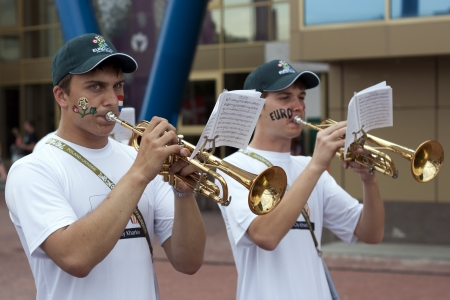 KHARKIV, UKRAINE - JUNE 9, 2012: Unidentified trumpeters brass band near the stadium Metalist in Kharkiv before the match Netherland vs. Denmark on June 9, 2012.のeditorial素材
