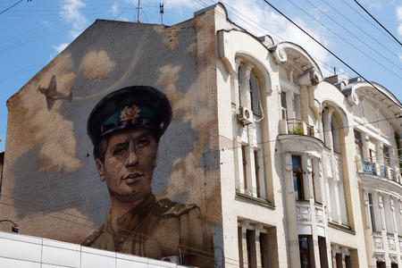 KHARKIV, UKRAINE - JUNE 18, 2013  Image of famous actor and director Leonid Bykov on the wall of a building in Kharkovのeditorial素材
