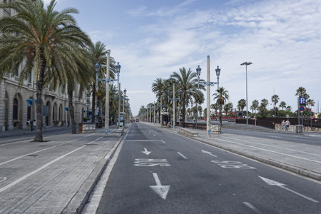 BARCELONA, SPAIN - JULY 13, 2013: Desert Columbus Avenue in Barcelona - besides a good road equipped with bike pathsのeditorial素材