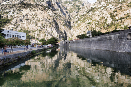 KOTOR. MONTENEGRO - JUNE 27, 2017: The river Shkurda is a river running along the fortress wall of Kotor's Old Town.のeditorial素材