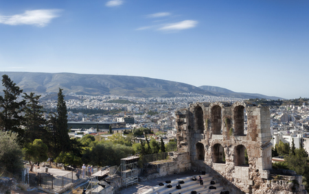 ATHENS, GREECE - JUNE 29, 2018: Fragment of Dionysus Theatre ruins on the Athens Acropolis against background of Athens panoramaのeditorial素材