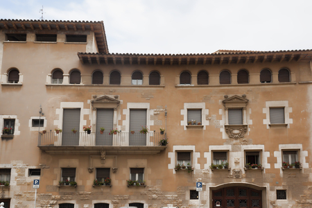 GIRONA, SPAIN - JULY 17, 2013: Old house with a coat of arms near the Cathedral of Gironaのeditorial素材