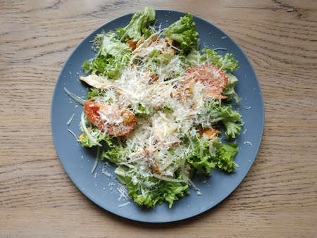 CAESAR SALAD WITH CHICKEN". Salad, chicken, fried bacon, cherry tomatoes, crouton, parmesan and Caesar dressingの写真素材