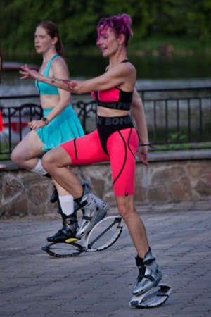 SVIATOHIRSK, UKRAINE - MAY 29, 2021: Club Kangoo Jumps Sloviansk-Kramatorsk on the embankment of Sviatohirsk participates in the Master class from international instructorsのeditorial素材
