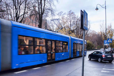 KRAKOW, POLAND - NOVEMBER 4, 2021: On St. Gertrude Street in Krakow. Moving (slightly blurry) tramのeditorial素材