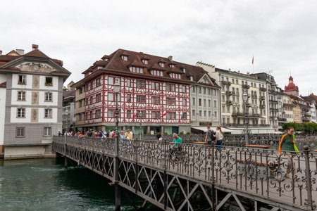 LUCERNE, SWITZERLAND - JULY 13, 2024: Lucerne bridge over the river Reussのeditorial素材
